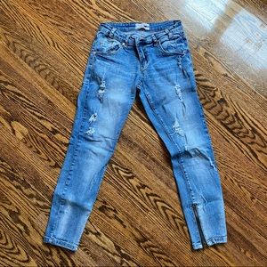 Distressed blue jeans